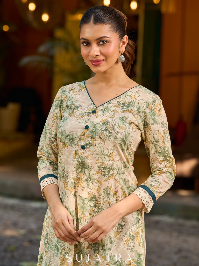 Soft cream delicate floral a line kurta with refined bottle green accents