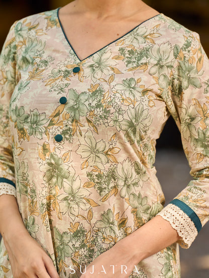 Soft cream delicate floral a line kurta with refined bottle green accents