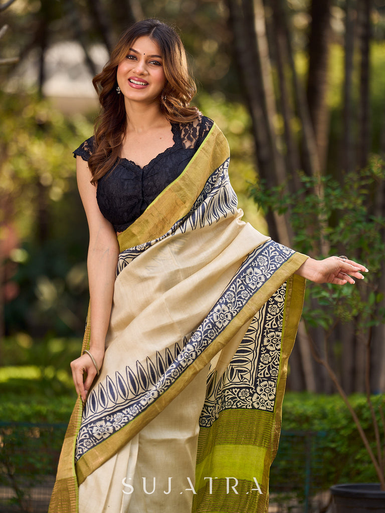 Off-White Handwoven Pure Tussar Silk Block Printed Saree with Traditional Green and Gold Zari Detailing