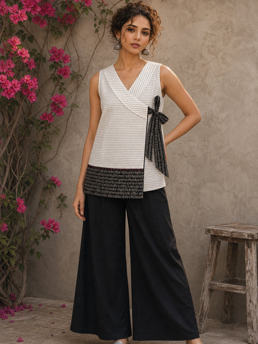 Refined black cotton pants crafted for all-day comfort, graceful movement, and versatile wardrobe styling.