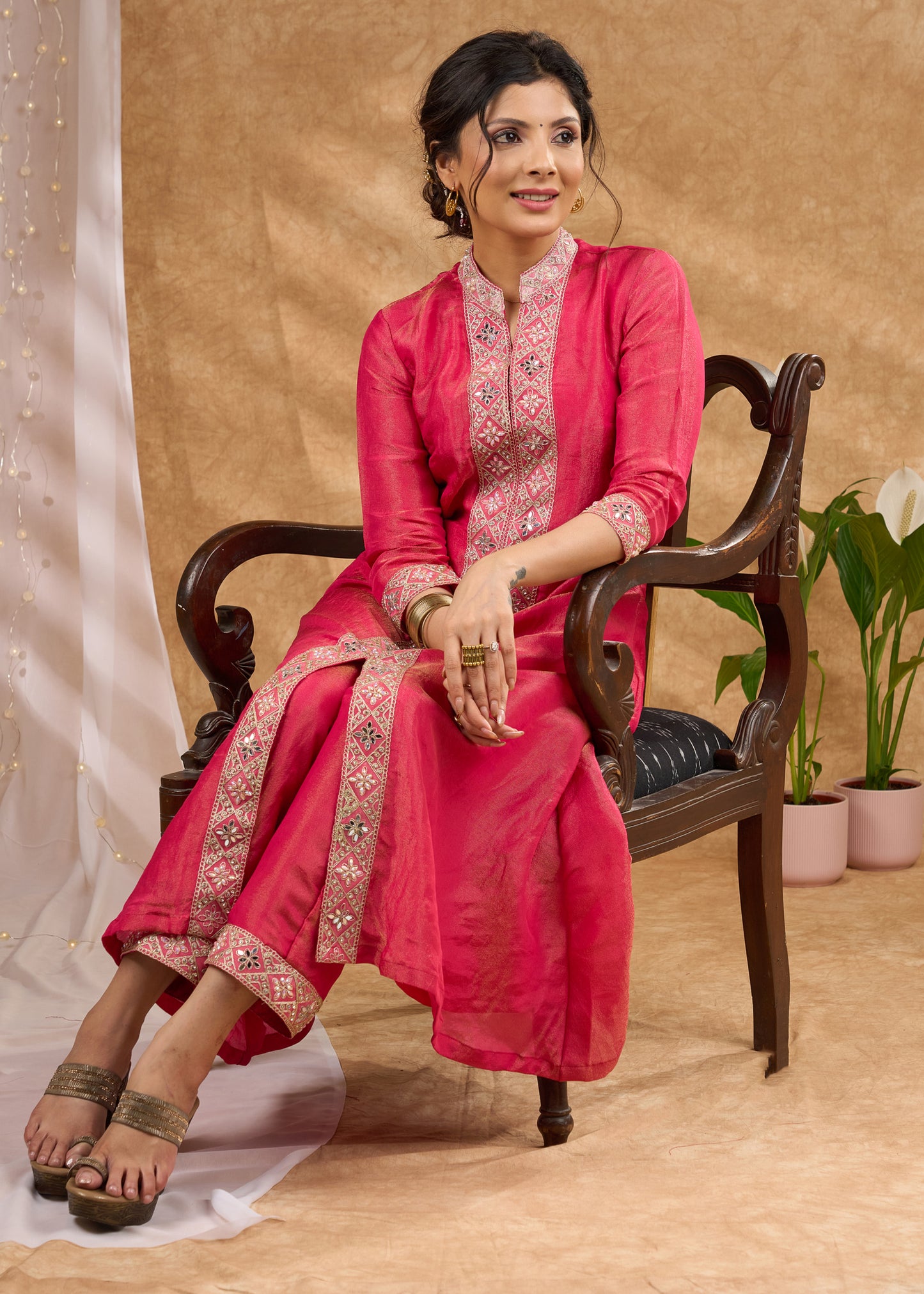 Delicate pink kurta with subtle highlights and details Tissue pant optional