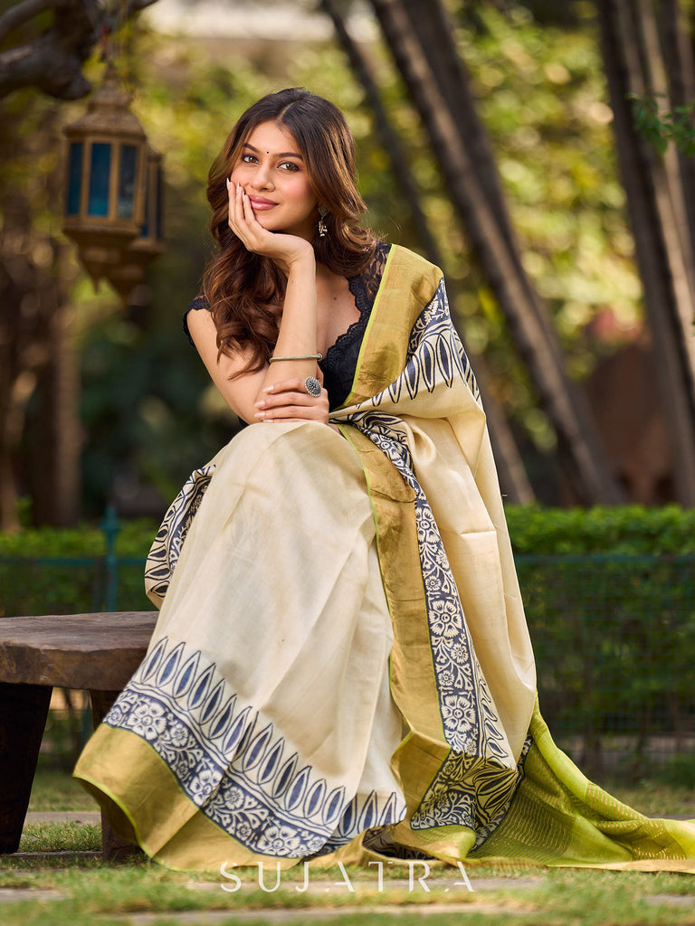 Off-White Handwoven Pure Tussar Silk Block Printed Saree with Traditional Green and Gold Zari Detailing