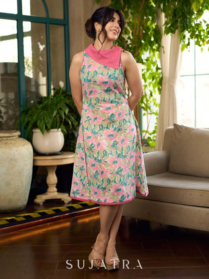 Dussehra Sale — Summer pink floral sleeveless dress featuring an asymmetrical cowl collar and delicate pearl accents, creating a soft, fluid silhouette with a touch of elegant, contemporary charm.