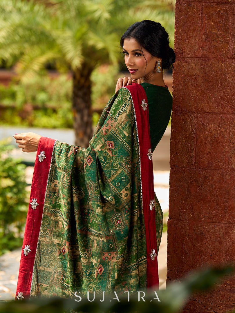 Sophisticated Dark Green Viscose Printed Saree with Diamond-Studded Border & Pallu