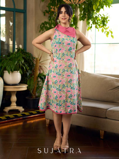 Dussehra Sale — Summer pink floral sleeveless dress featuring an asymmetrical cowl collar and delicate pearl accents, creating a soft, fluid silhouette with a touch of elegant, contemporary charm.