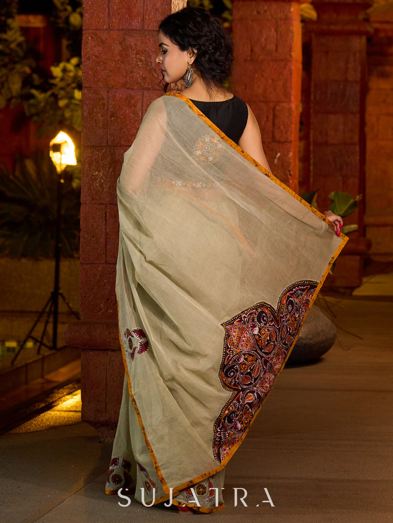 Classic olive Chanderi saree enhanced with heritage batik appliqué