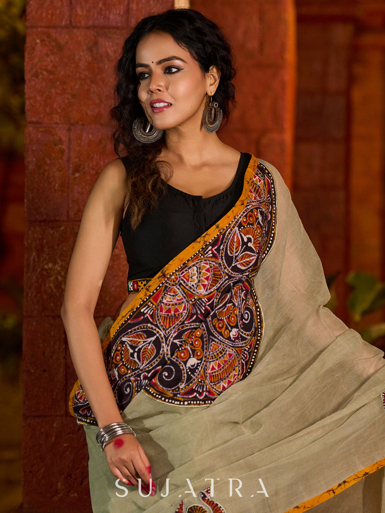 Classic olive Chanderi saree enhanced with heritage batik appliqué