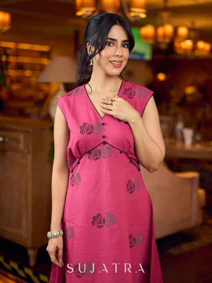 Rich wine drop-shoulder dress with black and grey hand block printed floral motifs, a softly gathered yoke, black pearl embellishments, and bold black accents for a striking artisanal look.