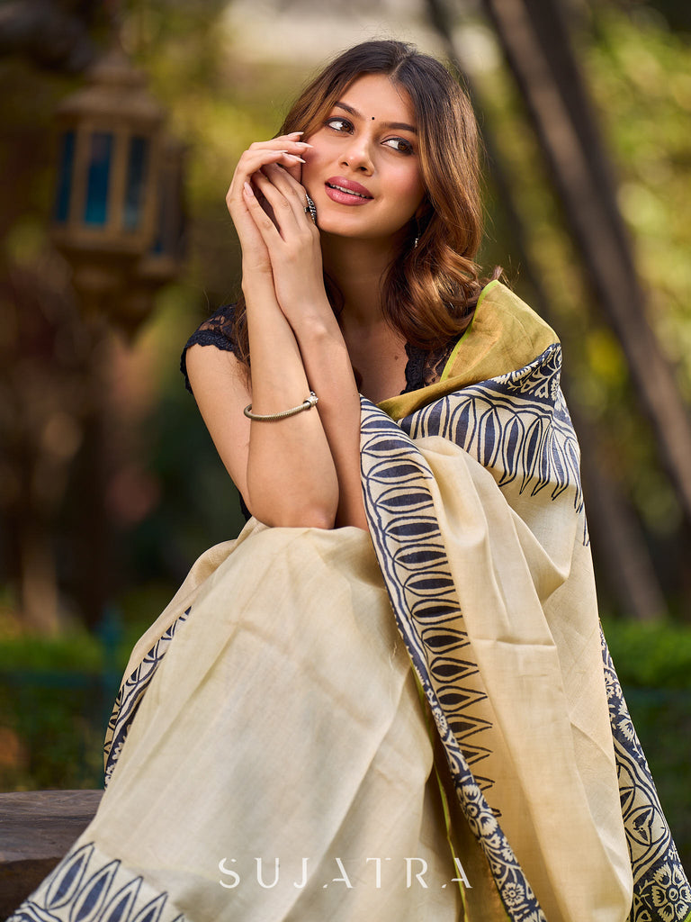 Off-White Handwoven Pure Tussar Silk Block Printed Saree with Traditional Green and Gold Zari Detailing