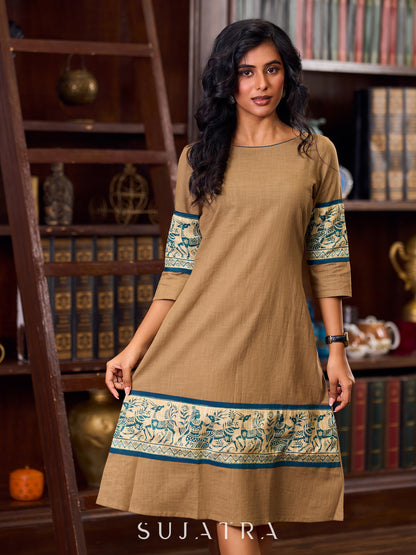 Elegant Beige Cotton A-Line Dress Adorned with Madhubani Border Detailing on Hem and Cuffs