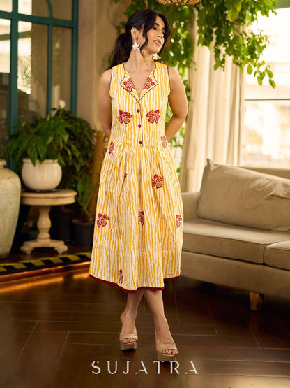 Yellow and white zebra-striped hand block printed sleeveless vintage luxe dress with maroon bird motifs and matching accents for a bold, elegant statement look.