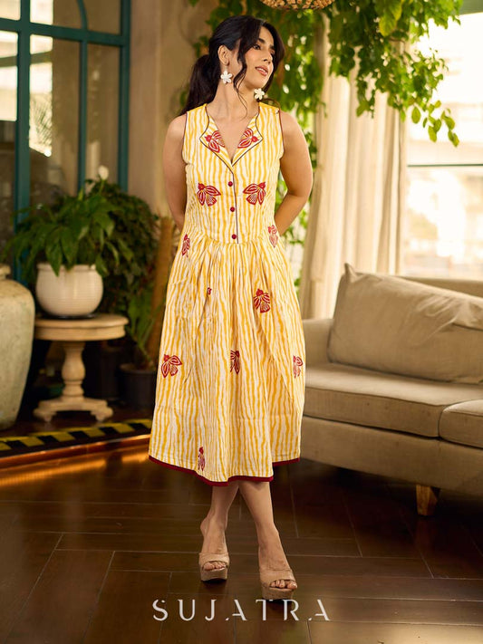 Yellow and white zebra-striped hand block printed sleeveless vintage luxe dress with maroon bird motifs and matching accents for a bold, elegant statement look.