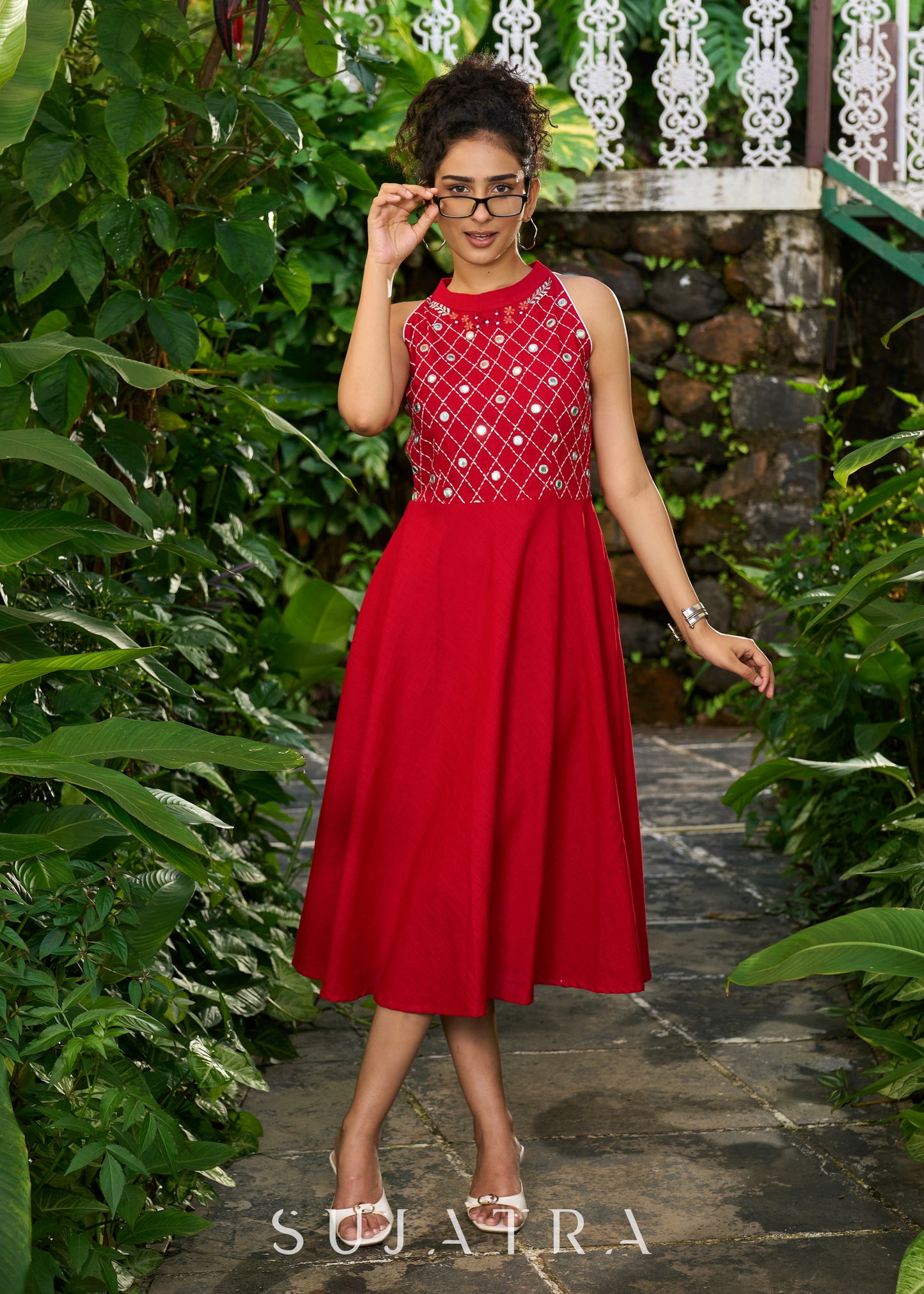 Stylish red cotton halter neck dress highlighted with mirror embroidery on yoke