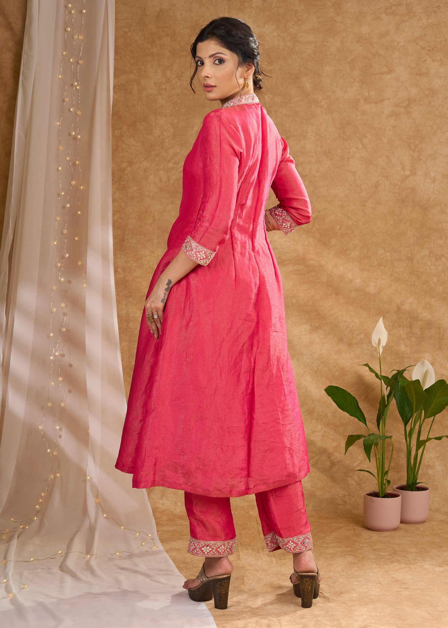 Delicate pink kurta with subtle highlights and details Tissue pant optional