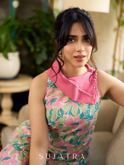 Dussehra Sale — Summer pink floral sleeveless dress featuring an asymmetrical cowl collar and delicate pearl accents, creating a soft, fluid silhouette with a touch of elegant, contemporary charm.