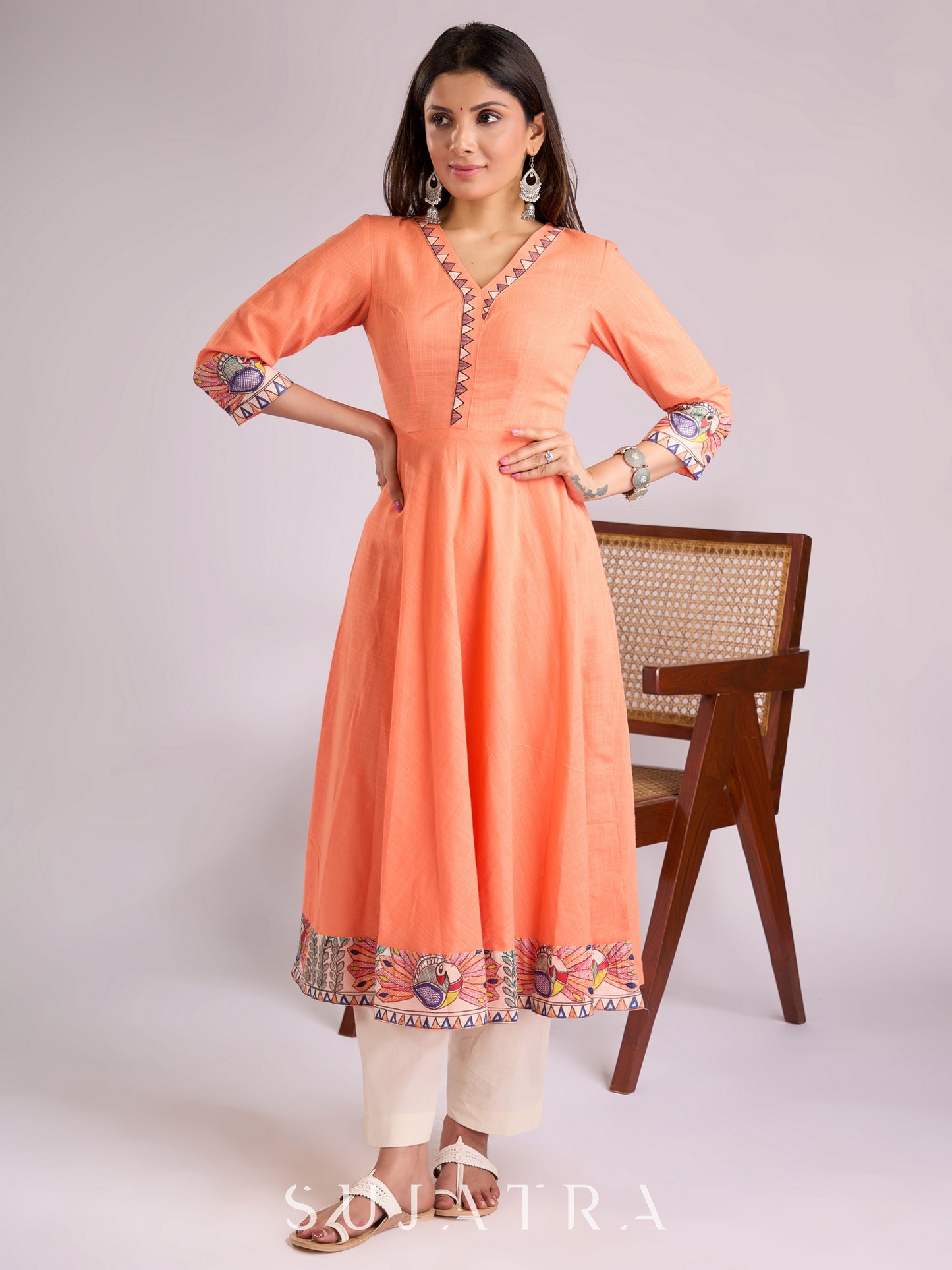 Elegant Peach Cotton Kurta with Madhubani Border & Hand Painted Neckline Detailing