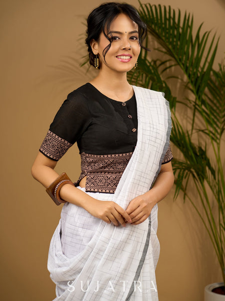 Trendy combination of black cotton ajrakh blouse .