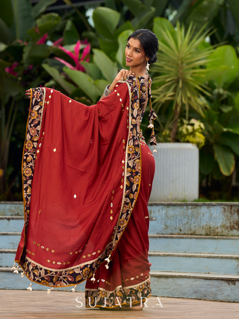 Traditional Rust Modal Silk Saree with Hand Embroidered Mirror Work & Kalamkari Printed Border
