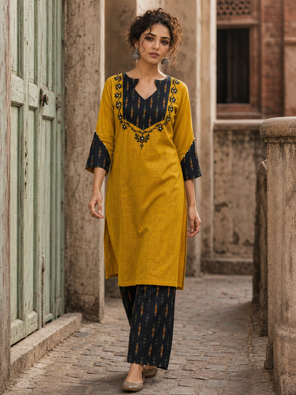 Bold Mustard Cotton Kurta with Black Ikat V-Yoke & Floral Embroidery with Pearl Accent Detail
