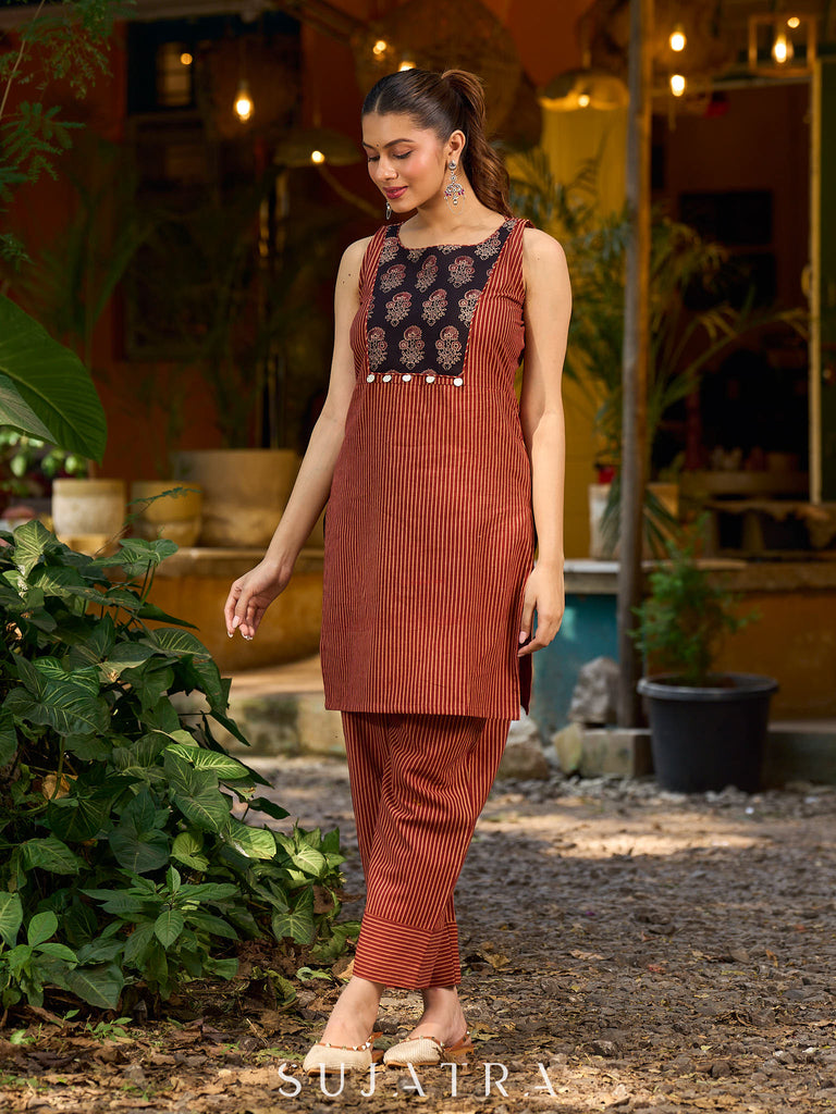 Handcrafted Maroon Ajrakh stripe kurta with a black floral patch