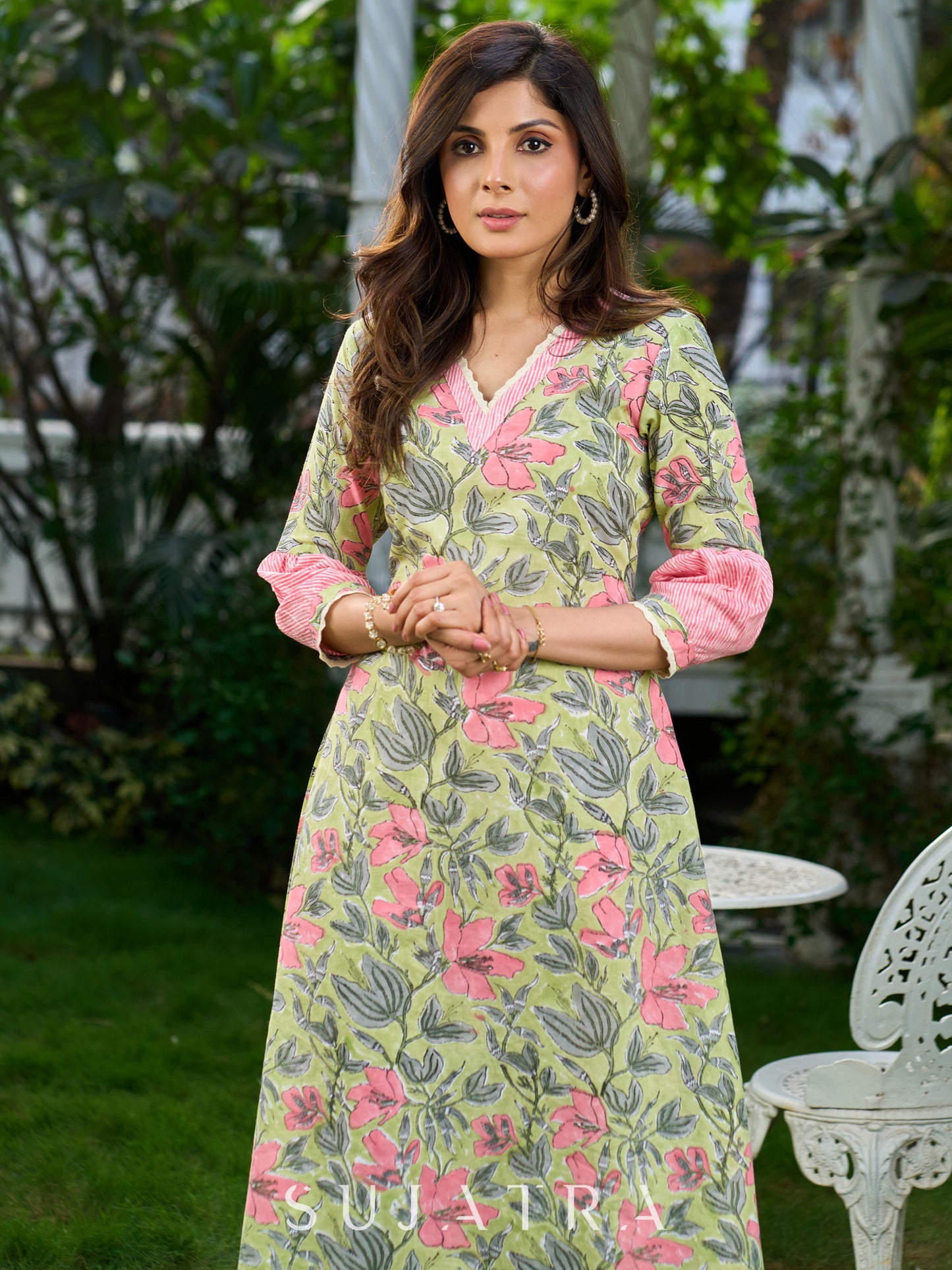 Graceful Pista Green Dress with Contrasting Pink Touches and Lace Detailing