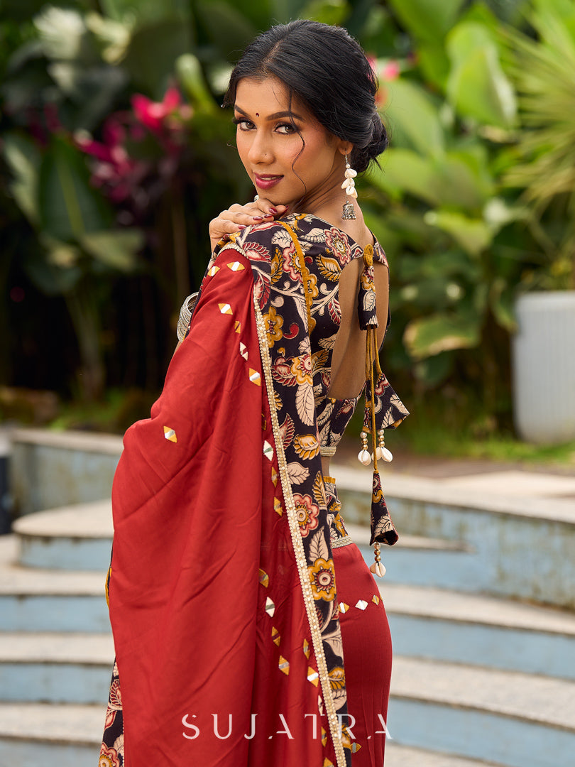 Traditional Rust Modal Silk Saree with Hand Embroidered Mirror Work & Kalamkari Printed Border