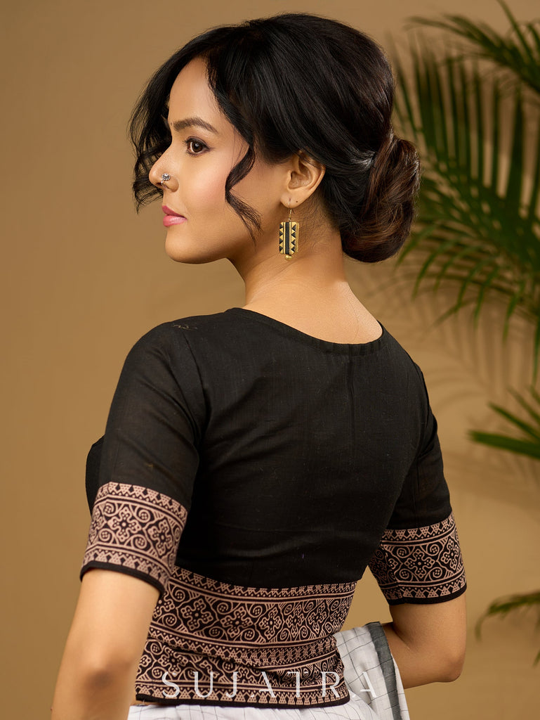Trendy combination of black cotton ajrakh blouse .