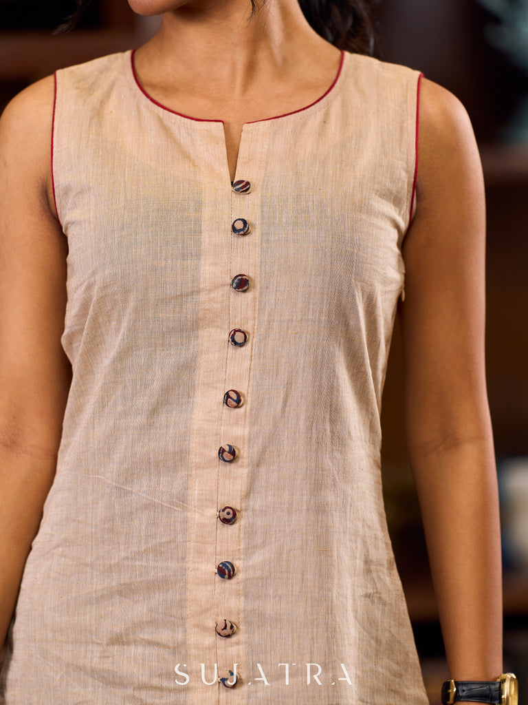 Charming Beige A-Line Dress With Ajrakh Border, Maroon Touches And Statement Buttons