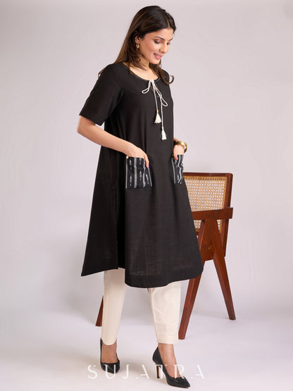 Timeless Black Cotton Kurta with Ikat Pockets, Kantha Handwork & Tassel-Tied Neckline