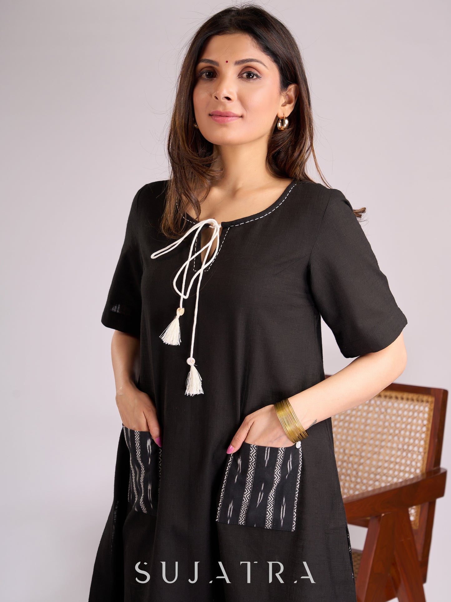 Timeless Black Cotton Kurta with Ikat Pockets, Kantha Handwork & Tassel-Tied Neckline