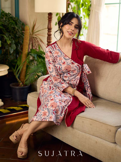 Jaipur-printed maroon floral crossover dress featuring a wrap-style silhouette with a coordinating floral tie-up, creating a flattering cinched waist and a breezy, feminine flow.