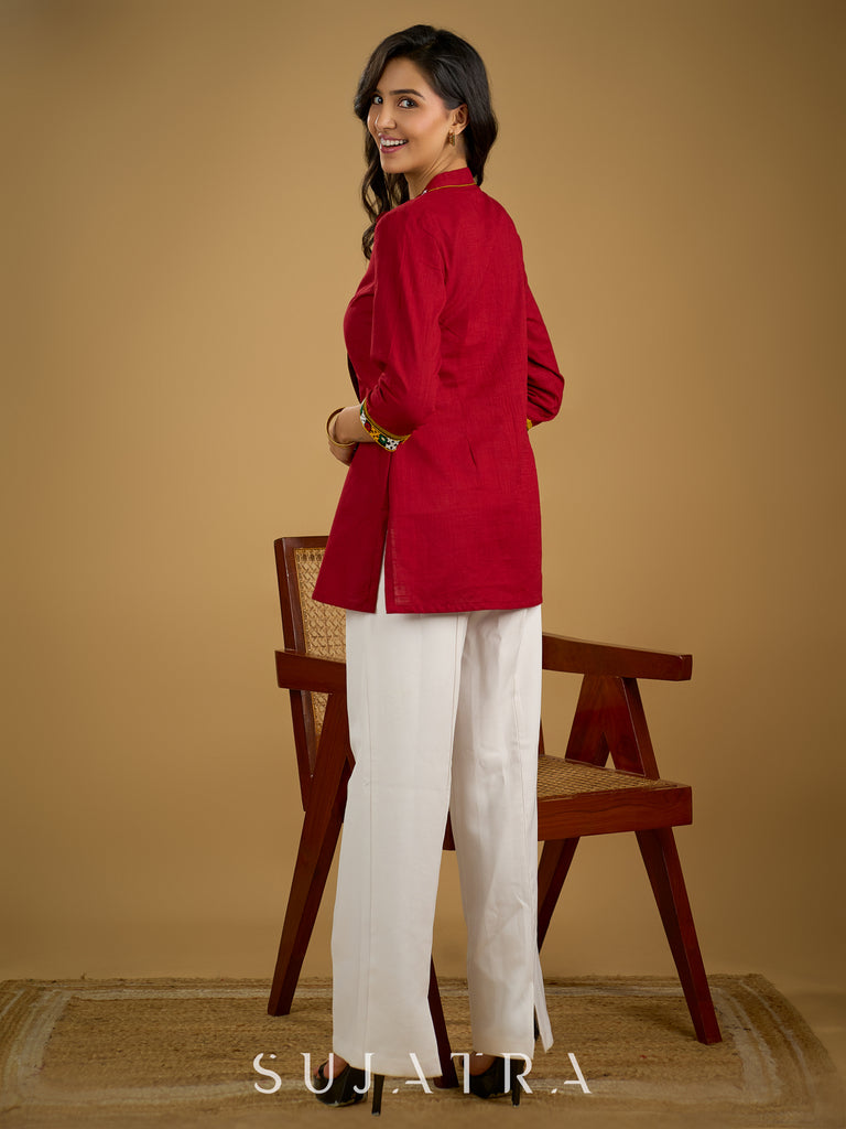 Elegant maroon cotton top featuring mirror work and side collar.