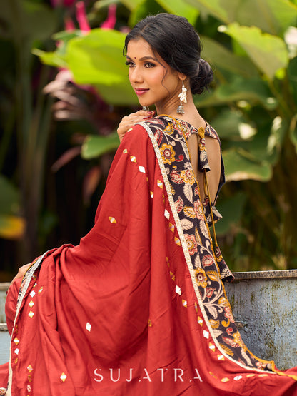 Traditional Rust Modal Silk Saree with Hand Embroidered Mirror Work & Kalamkari Printed Border