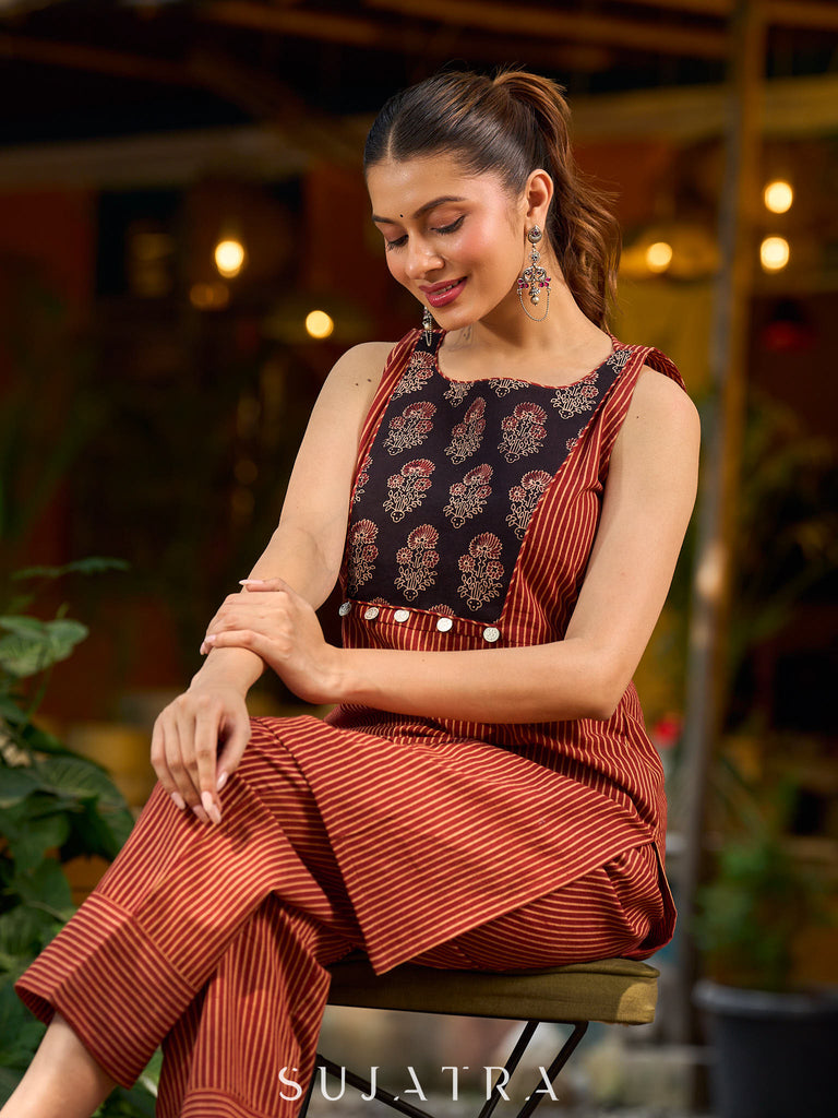 Handcrafted Maroon Ajrakh stripe kurta with a black floral patch