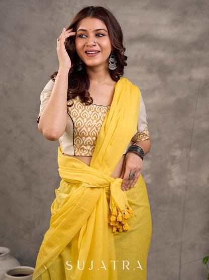 Off White and Mustard Elbow Sleeve Blouse with Contrast Piping and Hand Painted Gond Art on Back