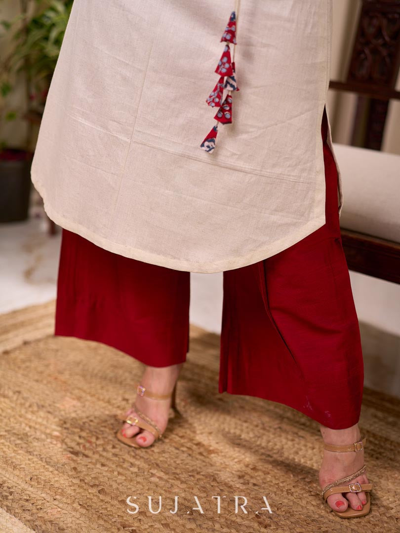 Off White Cotton Flex Apple-Cut Kurta with Red Printed Yoke and Tassel Detail