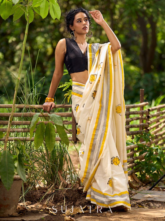 Breezy Off-White Cotton Saree with Fresh Floral Hand Block Print and Yellow Border Highlights