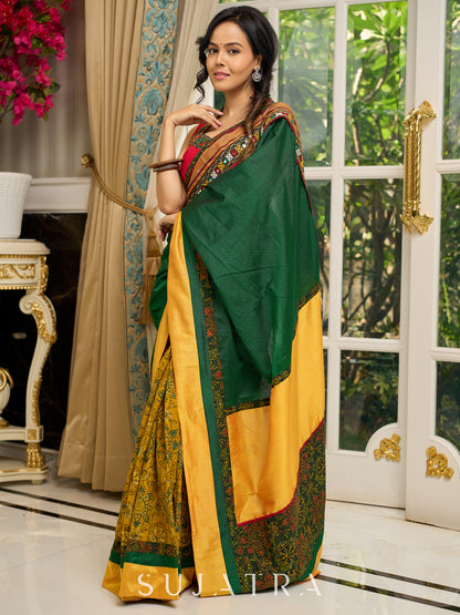 Vibrant Khun-Ajrakh fusion cotton saree with bold block prints and mirrorwork