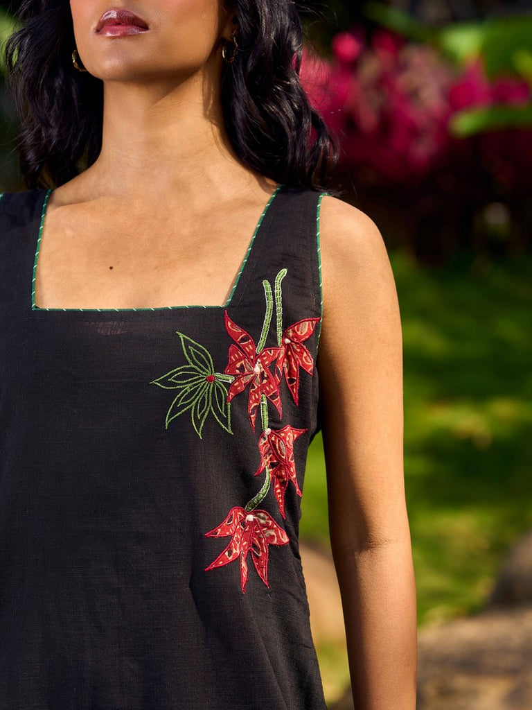 Chic Black Cotton Dress With Handcrafted Red Floral Applique And Contrast Green Detailing