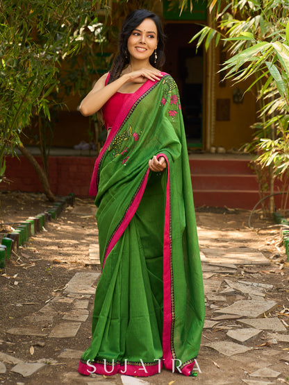Green Cotton Saree with Handpainted Florals and Contrasting Pink & Black Border