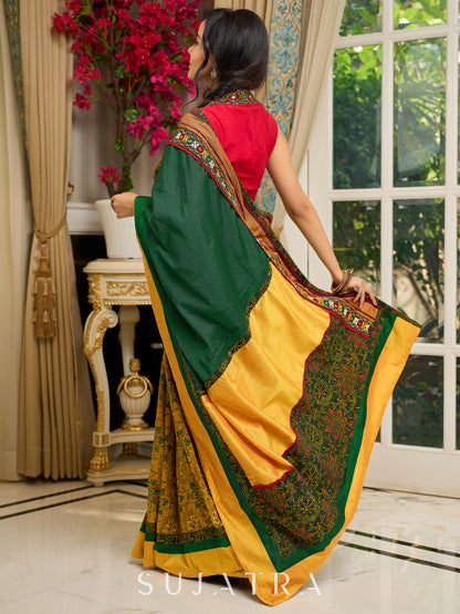 Vibrant Khun-Ajrakh fusion cotton saree with bold block prints and mirrorwork