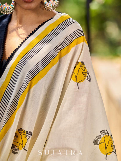 Breezy Off-White Cotton Saree with Fresh Floral Hand Block Print and Yellow Border Highlights