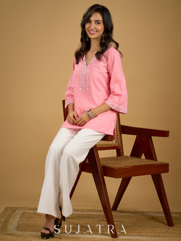 Elegant baby pink cotton top highlighted with subtle thread embroidery