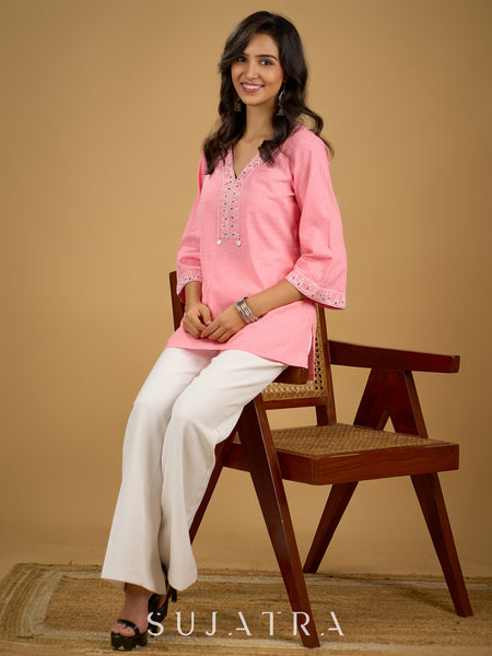 Elegant baby pink cotton top highlighted with subtle thread embroidery