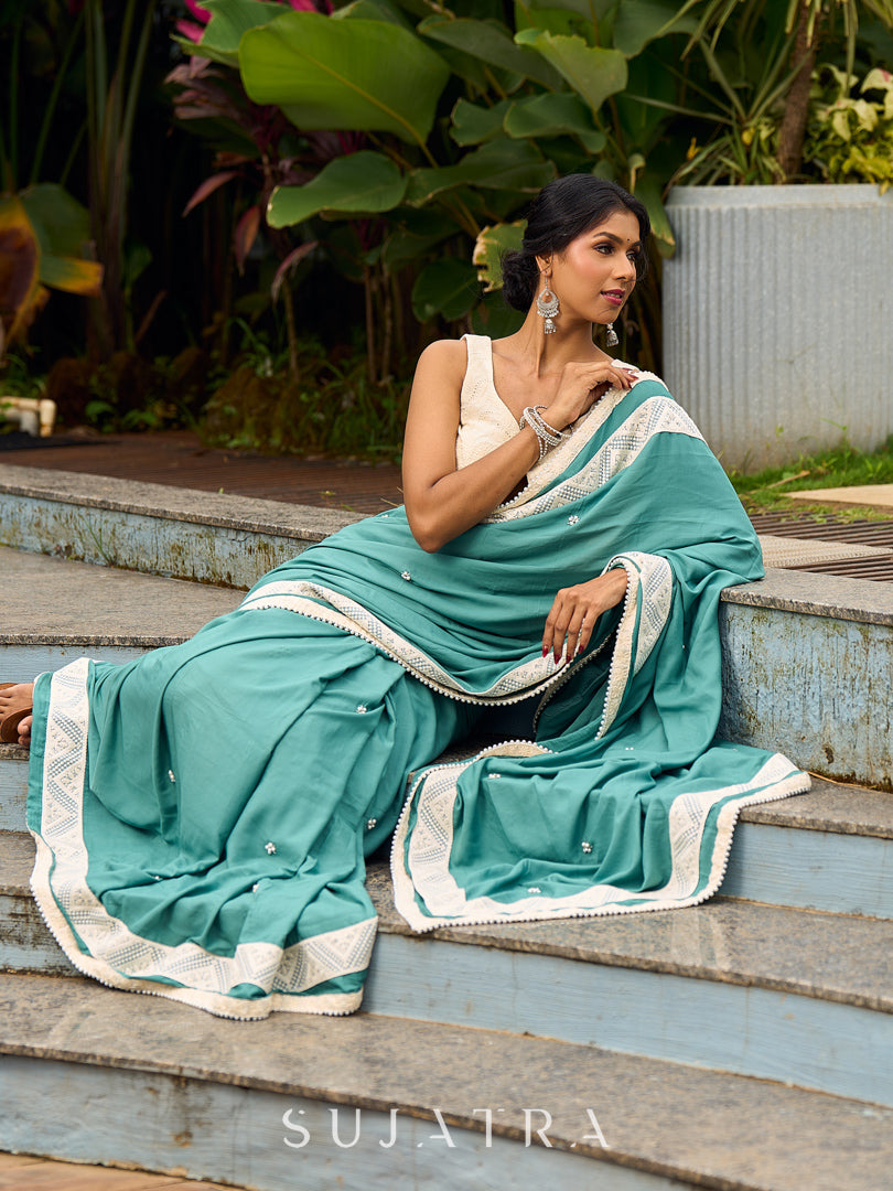 Vibrant Sea Green Modal Saree with Ivory Chevron Border & Minimal Hand Embroidery