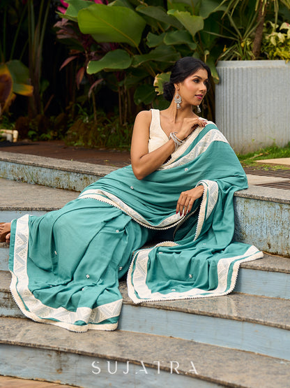 Vibrant Sea Green Modal Saree with Ivory Chevron Border & Minimal Hand Embroidery