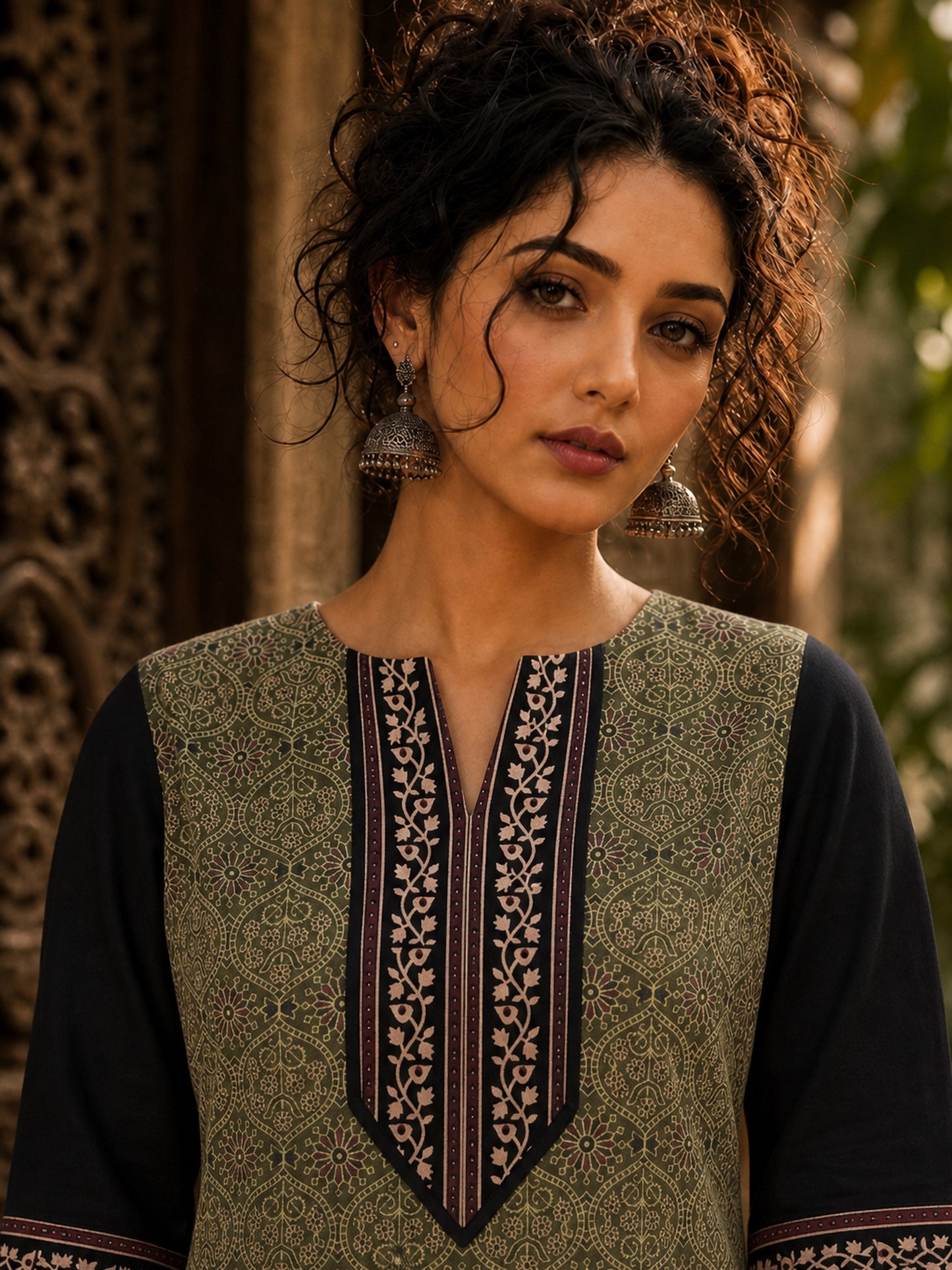 Regal Olive Ajrakh Print Kurta with Black Contrast Sleeves & Coordinated Ajrakh Border Detailing