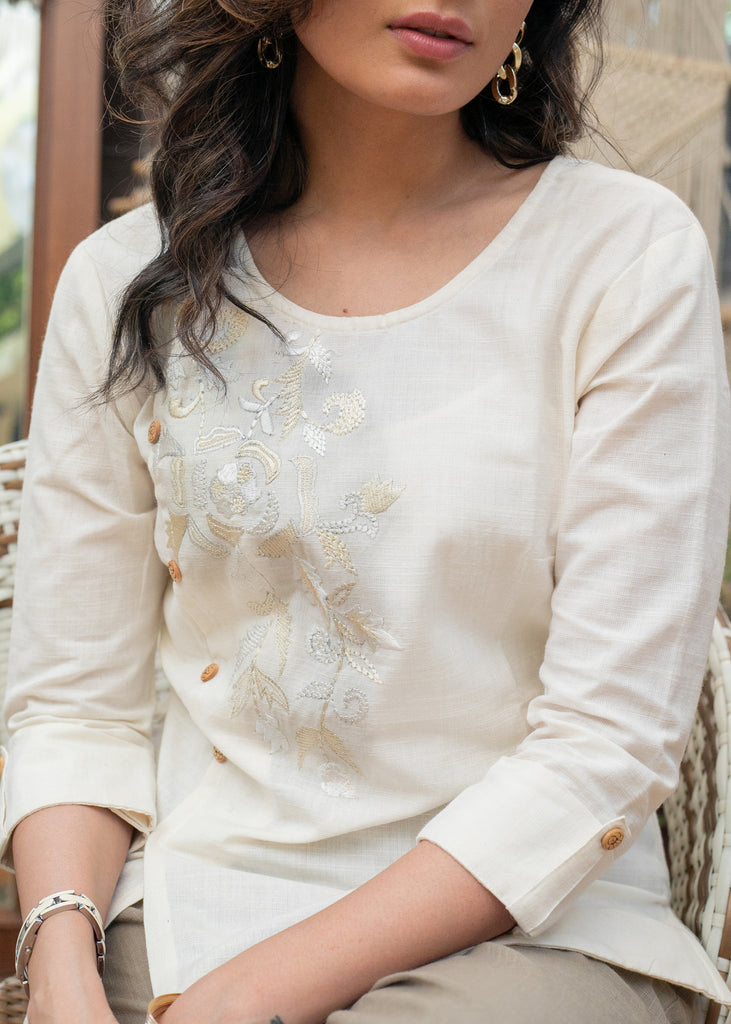 Elegant White Cotton Top with Beautiful Embroidery on One Side Highlighted with Golden Buttons