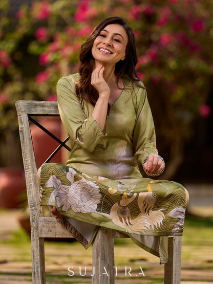 Ethereal soft green ombré kurta adorned with swan-inspired motifs