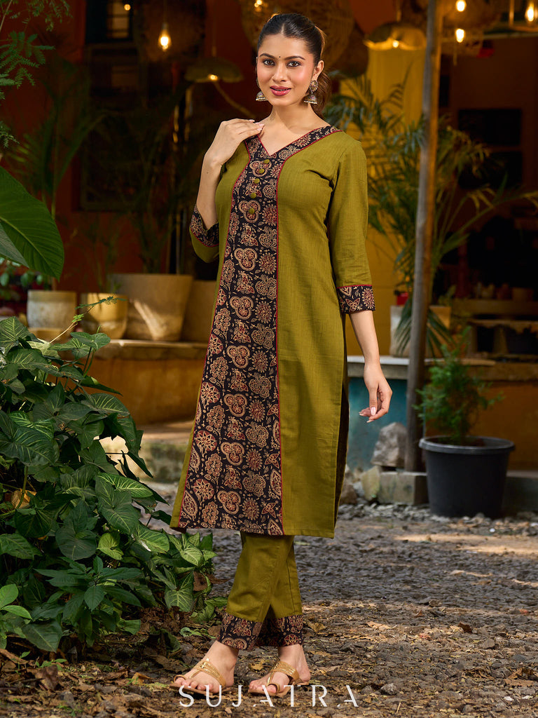 Olive kurta elevated with a black Ajrakh centre panel and Maroon details